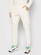 Spodnie sportowe męskie - Adidas Spodnie dresowe adicolor Essentials HE9410 Beżowy Slim Fit - miniaturka - grafika 1