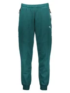 Spodnie sportowe damskie - Puma Spodnie dresowe "C+ PMA Pumatech" w kolorze zielonym - miniaturka - grafika 1