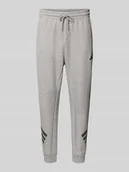 Spodnie sportowe męskie - Spodnie dresowe z elastycznym pasem i logo - miniaturka - grafika 1