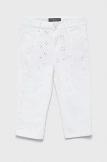 Spodnie damskie - Guess jeansy dziecięce kolor biały - grafika 1
