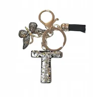 Breloki - Brelok z literą T - elegancki czarny design z motylem - miniaturka - grafika 1