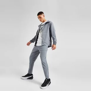 NIKE SPODNIE M NK DF UNLIMITED PANT TPR - Nike - Spodnie sportowe męskie - miniaturka - grafika 1