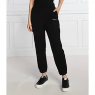 Dresy damskie - CALVIN KLEIN JEANS Spodnie dresowe | Relaxed fit - miniaturka - grafika 1