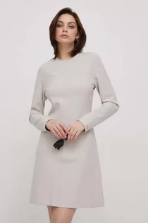 Sukienki - Calvin Klein sukienka kolor beżowy mini rozkloszowana - grafika 1