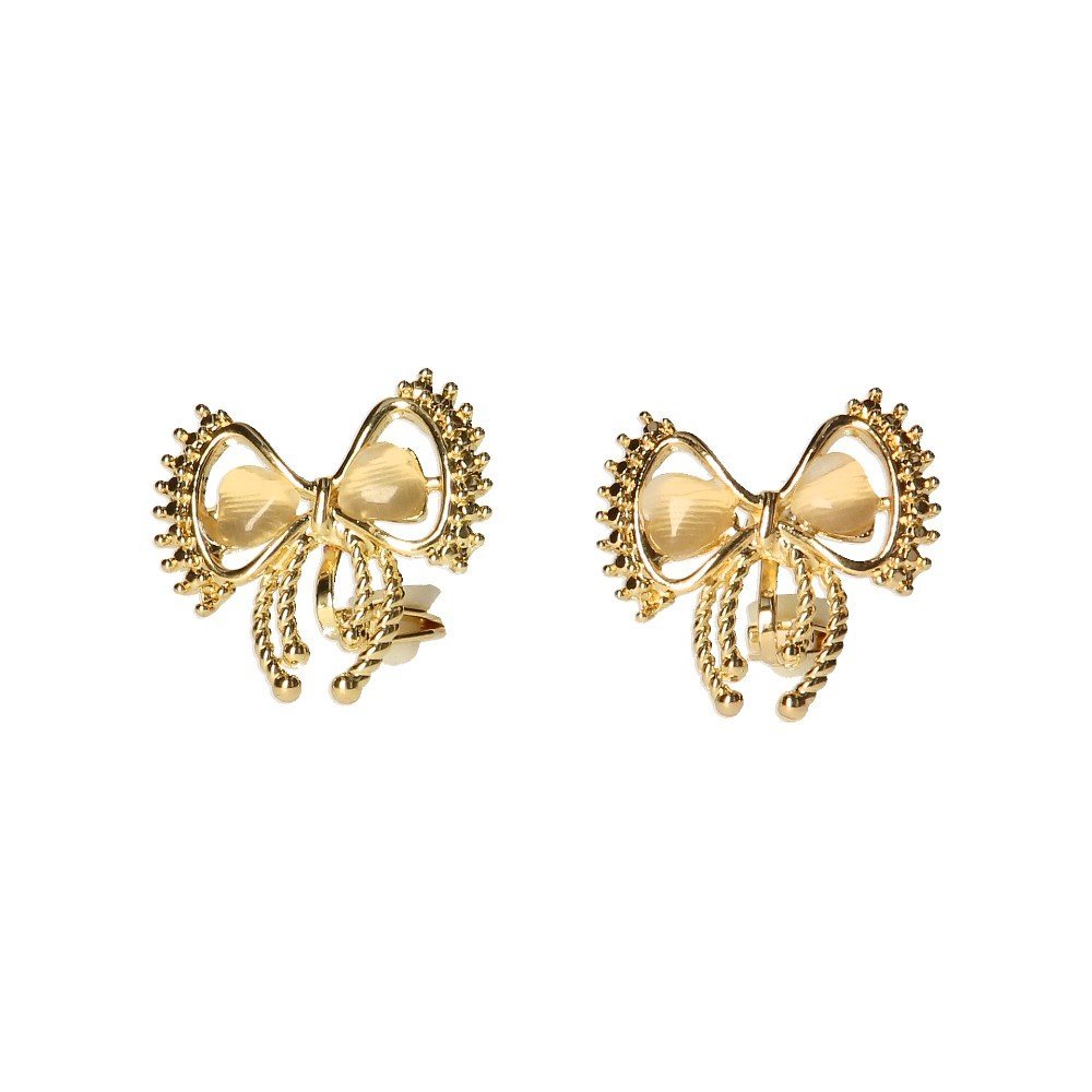 Klipsy do uszu złote z kokardką i jasnym kamieniem