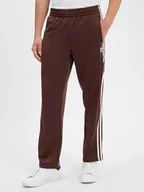 Spodnie męskie - adidas Originals Męskie spodnie dresowe - Firebird Mężczyźni brązowy jednolity, S - miniaturka - grafika 1