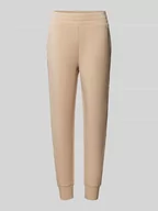 Spodnie sportowe damskie - Spodnie dresowe o kroju regular fit z lampasami model ‘SIMONNE’ - miniaturka - grafika 1