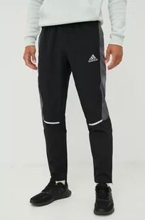adidas Performance spodnie dresowe męskie kolor czarny z nadrukiem - Spodnie męskie - miniaturka - grafika 1