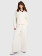 Spodnie sportowe damskie - 4F Spodnie dresowe z szerokimi nogawkami damskie - beżowe M - miniaturka - grafika 1