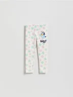 Spodnie i spodenki dla dziewczynek - Reserved - Bawełniane legginsy Bluey - złamana biel - miniaturka - grafika 1