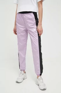 Spodnie damskie - The North Face spodnie dresowe kolor fioletowy wzorzyste - grafika 1