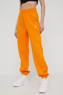 Spodnie damskie - Adidas Originals Originals spodnie dresowe Adicolor damskie kolor pomarańczowy gładkie - grafika 1