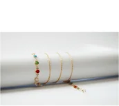 Akcesoria do okularów - Łańcuszek do okularów przeciwsłonecznych złoty z kryształkami - miniaturka - grafika 1