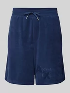 Spodnie sportowe męskie - Szorty z dzianiny dresowej o kroju regular fit z nadrukiem z logo - miniaturka - grafika 1