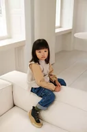 Swetry dla dziewczynek - Liewood kamizelka wełniana kolor beżowy - miniaturka - grafika 1