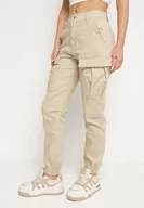 Spodnie damskie - Beżowe Bawełniane Joggery Jeansy z Gumką w Pasie i Kieszeniami z Klapami Nericella - miniaturka - grafika 1
