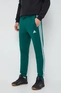 Spodnie męskie - adidas spodnie dresowe kolor zielony z aplikacją - miniaturka - grafika 1
