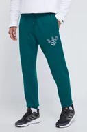 Spodnie męskie - adidas Originals spodnie dresowe bawełniane kolor zielony z aplikacją - miniaturka - grafika 1