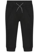 Spodnie i spodenki dla chłopców - Name it Spodnie dresowe Solid Coloured 13153684 Czarny Regular Fit Czarny - miniaturka - grafika 1