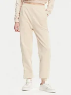 Spodnie sportowe damskie - Calvin Klein Jeans Spodnie dresowe J20J225355 Beżowy Regular Fit - miniaturka - grafika 1