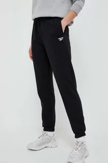 Spodnie damskie - Reebok spodnie dresowe kolor czarny gładkie - grafika 1