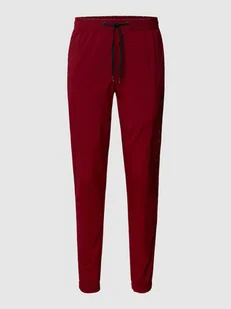 Spodnie treningowe o kroju relaxed tapered fit z nadrukiem z logo - Spodnie sportowe męskie - miniaturka - grafika 1
