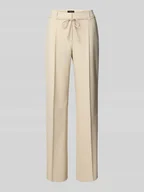 Spodnie damskie - Spodnie materiałowe z szerokimi nogawkami z dodatkiem wiskozy - miniaturka - grafika 1