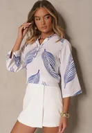 Koszule damskie - Biało-Niebieska Koszula z Bawełną i Motywem Liści Lumireline - miniaturka - grafika 1