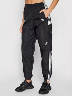 Spodnie sportowe damskie - Adidas Spodnie dresowe adicolor Classics Disrupted Icon H22870 Czarny Loose Fit - grafika 1