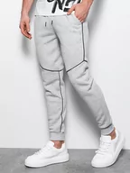 Spodnie męskie - Spodnie męskie dresowe joggery z kontrastowymi elementami - szary melanż V5 OM-PASK-22FW-001 - miniaturka - grafika 1