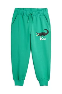 Spodnie i spodenki dla chłopców - Mini Rodini spodnie dresowe dziecięce kolor zielony z nadrukiem - grafika 1