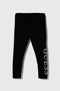 Spodnie i spodenki dla dziewczynek - Guess legginsy dziecięce kolor czarny z nadrukiem - grafika 1