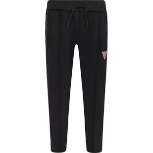 Guess Spodnie dresowe | Relaxed fit - Spodnie i spodenki dla chłopców - miniaturka - grafika 1