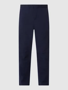 Spodnie sportowe męskie - Spodnie sportowe o kroju slim tapered fit z elastycznym pasem model ‘Fave’ - grafika 1