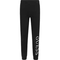 Spodnie sportowe damskie - Guess Legginsy | Slim Fit - miniaturka - grafika 1