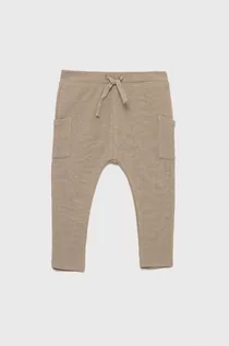 Spodnie i spodenki dla chłopców - Name it spodnie dresowe dziecięce kolor beżowy gładkie - - grafika 1