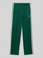 Spodnie i spodenki dla chłopców - Spodnie dresowe o kroju straight fit z logo - miniaturka - grafika 1