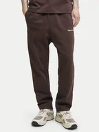 Spodnie sportowe męskie - Jack&Jones Spodnie dresowe Kane Norrebro 12282553 Czerwony Relaxed Fit - miniaturka - grafika 1