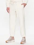 Spodnie sportowe męskie - New Balance Spodnie dresowe MP23551 Écru Relaxed Fit - miniaturka - grafika 1
