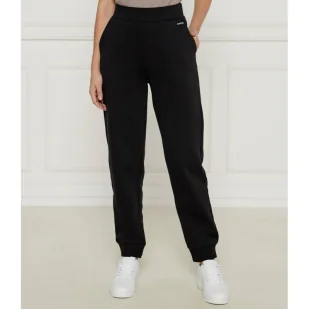 Calvin Klein Spodnie dresowe | Regular Fit - Dresy damskie - miniaturka - grafika 1
