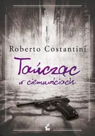 Kryminały - Tańcząc w ciemnościach - Roberto  Costantini - ebook - miniaturka - grafika 1