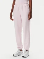 Spodnie sportowe damskie - New Balance Spodnie dresowe Essentials WP41500 Różowy Relaxed Fit - miniaturka - grafika 1