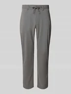 Spodnie męskie - Spodnie materiałowe o kroju tapered fit z tunelem - miniaturka - grafika 1