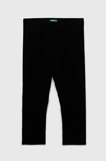 Spodnie i spodenki dla dziewczynek - United Colors of Benetton legginsy dziecięce kolor czarny gładkie - grafika 1