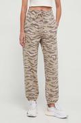Spodnie damskie - adidas by Stella McCartney spodnie dresowe kolor beżowy wzorzyste - miniaturka - grafika 1