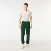 Spodnie męskie - Lacoste Męskie spodnie dresowe ze szczotkowanego polaru - miniaturka - grafika 1