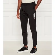 Dresy męskie - Tommy Jeans Spodnie dresowe Slim Fit - miniaturka - grafika 1