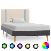 Łóżka - vidaXL Rama łóżka z LED, kremowo-ciemnoszara, tkanina, 100 x 200 cm - miniaturka - grafika 1