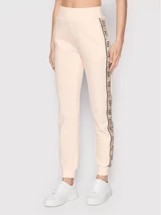 Guess Spodnie dresowe V2RB05 KA3P1 Pomarańczowy Relaxed Fit - Spodnie sportowe damskie - miniaturka - grafika 1