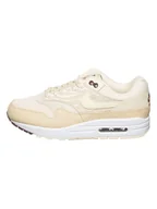 Trampki damskie - Nike Skórzane sneakersy "Air Max 1 '87" w kolorze kremowo-beżowym - miniaturka - grafika 1